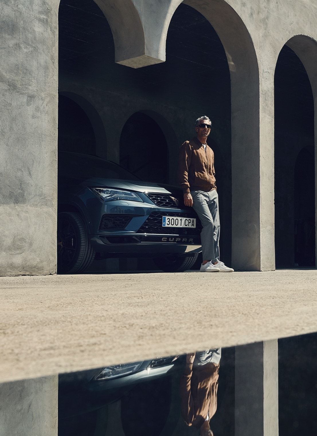 Man leaning on CUPRA Formentor front grill